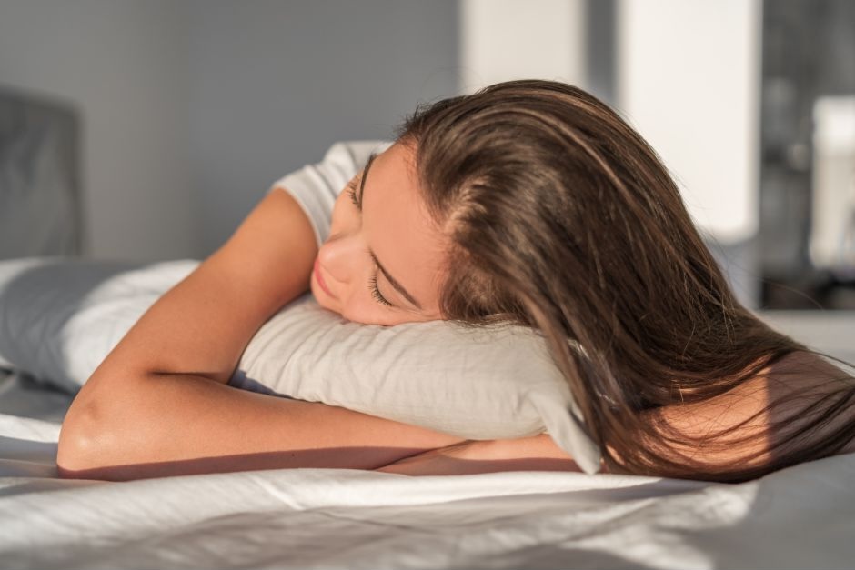 Woman on linen pillow